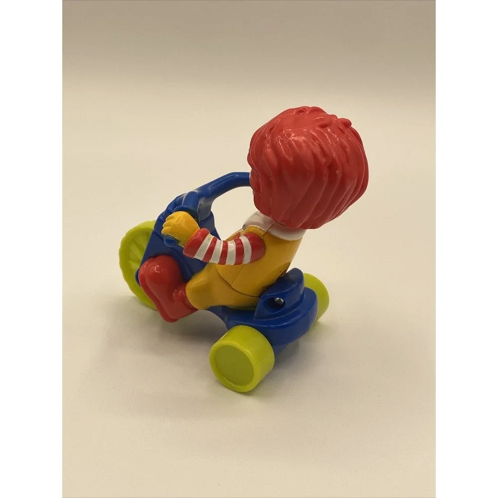 VTG McDonald's - Baby Ronald McDonald on Big Wheel - Fisher Price Happy Meal Toy